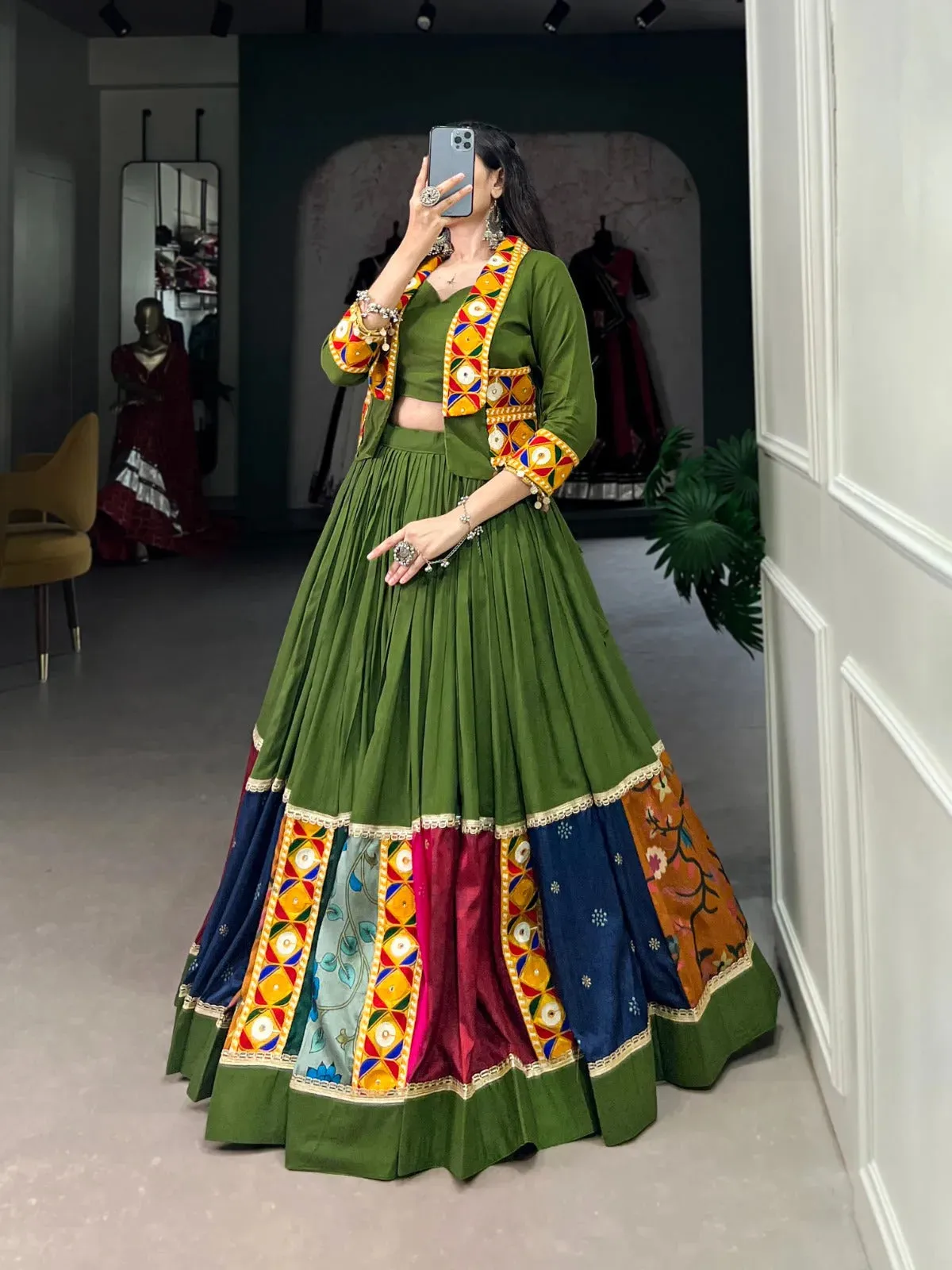 Vibrant and Mesmerizing Mahendi Green Navratri Rayon Lehenga Choli